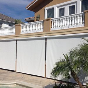 White Roller Shades covering patio